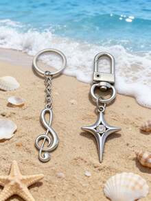 2 piezas de regalos creativos y prácticos - Llaveros de notas musicales de metal personalizados, pequeños colgantes publicitarios, anillos de llave con símbolo musical, eslabones de cadena, llaveros de estrella hueca de aleación de moda, colgantes. - Plateado - Ver 3