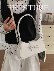 1个FEISTURE PU皮革蝴蝶结翻盖单肩包，时尚女士腋下法棍包，适合日常外出、约会、通勤。 - 白色 - 查看 5
