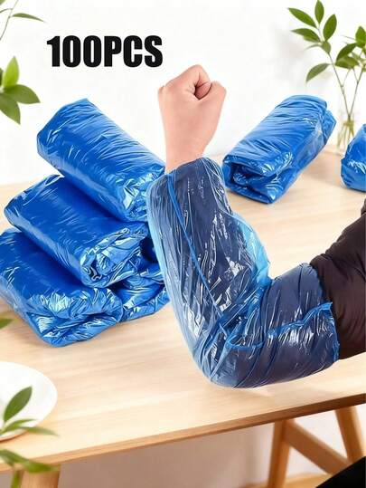 Fundas protectoras desechables de plástico PE transparente. Estas fundas protectoras para la limpieza del hogar tienen propiedades impermeables, resistentes al aceite y al polvo, con un diseño de puño elástico para un ajuste . Este es un accesorio de cocina práctico, muy adecuado para la limpieza de la cocina, la pintura y los trabajos de reparación. Estas fundas para mangas pueden proteger eficazmente su ropa y son una opción ideal para el entorno de la cocina y el comedor.
