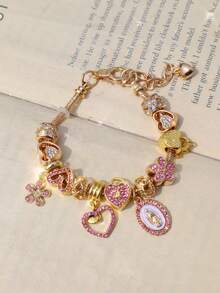 1 vòng tay mặt dây chuyền hình Đức Mẹ Đồng Trinh, 1 vòng tay hình thánh giá, 1 vòng tay tự làm hình hoa anh đào thời trang, 1 vòng tay hình trái tim có khóa và chìa khóa thời trang. - Bạc - Xem 5