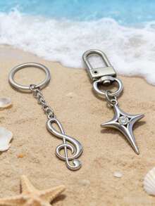 2 piezas de regalos creativos y prácticos - Llaveros de notas musicales de metal personalizados, pequeños colgantes publicitarios, anillos de llave con símbolo musical, eslabones de cadena, llaveros de estrella hueca de aleación de moda, colgantes. - Plateado - Ver 1