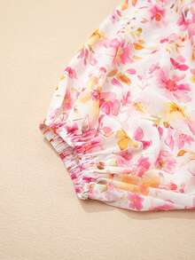 Blusa con estampado floral, mangas con volantes, cuello en V, cintura fruncida y flecos en color rosa - Rosa - Ver 10