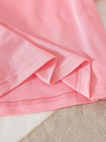 Bộ đồ bé gái mùa hè 2026 gồm áo thun ngắn tay màu hồng và quần ống rộng kẻ caro, 2 món. - Hồng - Xem 9