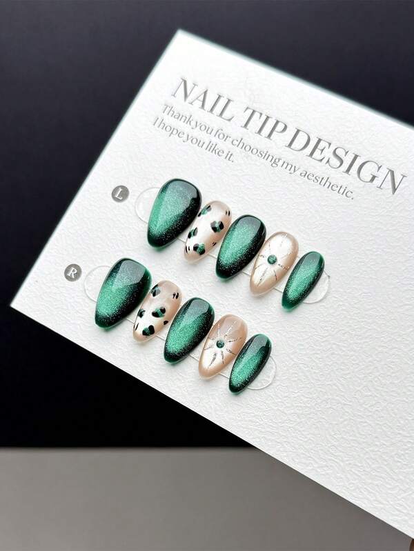 10 Pieces Of Purely Handmade Press-On Nail Tips, Featuring Short Almond-Shaped Nails, Exude A Noble And Light Luxury Style. They Showcase Hand-Painted Deep, Profound Dark Green Jade-Colored Chase-Light Cat's-Eye And Nude Cat's-Eye Effects, Adorned With Hand-Drawn Green Leopard Print Animal Patterns And Sun Motifs. These Are High-End Nail Art Press-On Nail Tips Suitable For Daily Wear By Ladies And Girls, Coming With A Nail Kit.