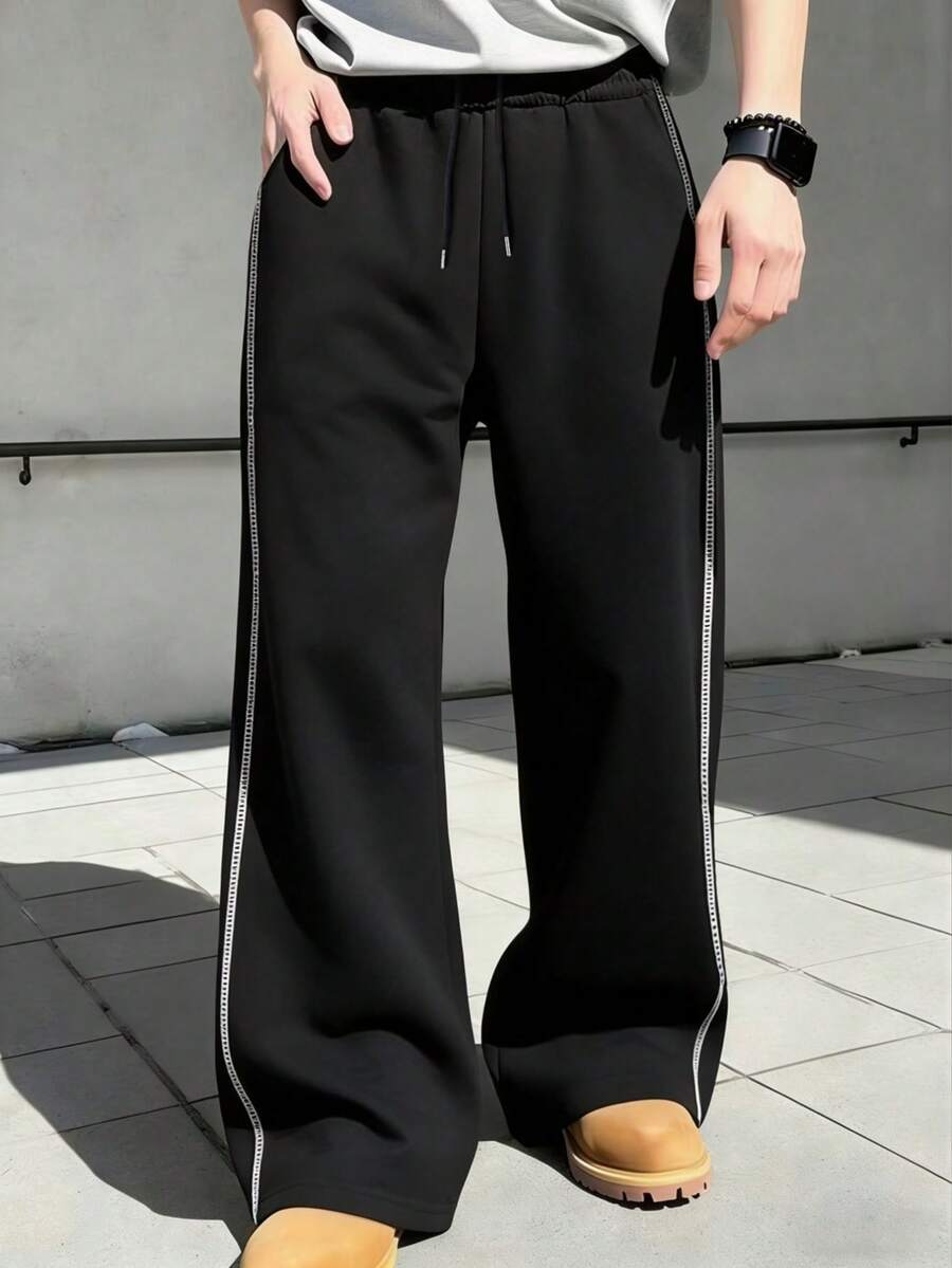 男士宽松休闲裤，简约街头风日常穿着，喇叭裤腿运动裤，适合户外、健身、跑步，春秋季穿着。 - 黑色 - 查看 1