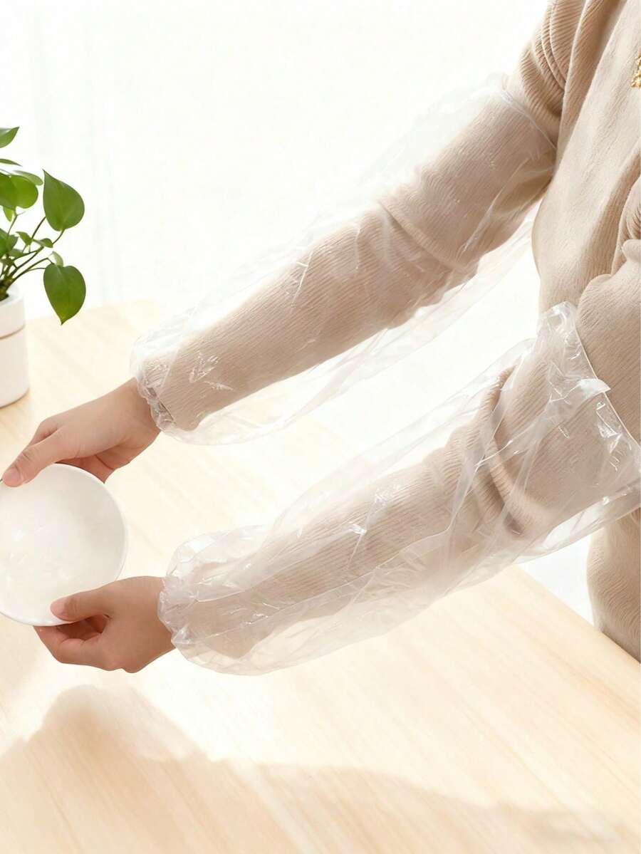 Disposable Transparent PE Plastic Protective Sleeve Covers. These Protective Sleeve Covers For Household Cleaning Have Waterproof, Oil-Proof And Dust-Proof Properties, With An Elastic Cuff Design For A Secure Fit. This Is A Practical Kitchen Accessory, Very Suitable For Kitchen Cleaning, Painting And Repair Work. These Sleeve Covers Can Effectively Protect Your Clothes And Are An Ideal Choice For The Kitchen And Dining Environment.