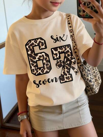 Áo thun vintage ngọt ngào và cá tính dành cho nữ tuổi teen, in họa tiết da báo "67" rộng rãi, tay ngắn dáng rộng, phù hợp cho đi học, phong cách đường phố và mặc thường ngày vào mùa hè.