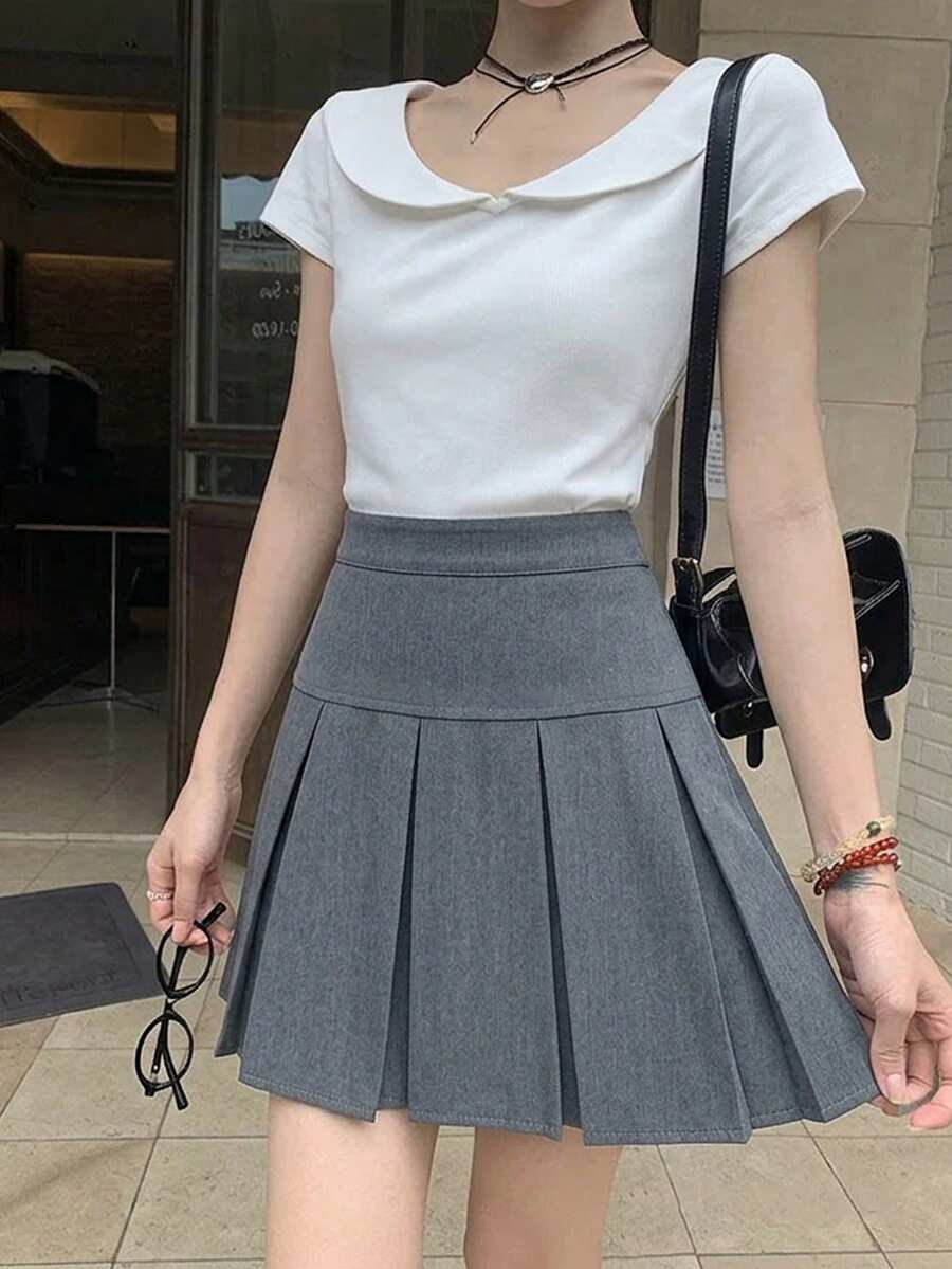 Chân váy xếp ly nữ màu trơn, kiểu dáng thường ngày, đa năng.