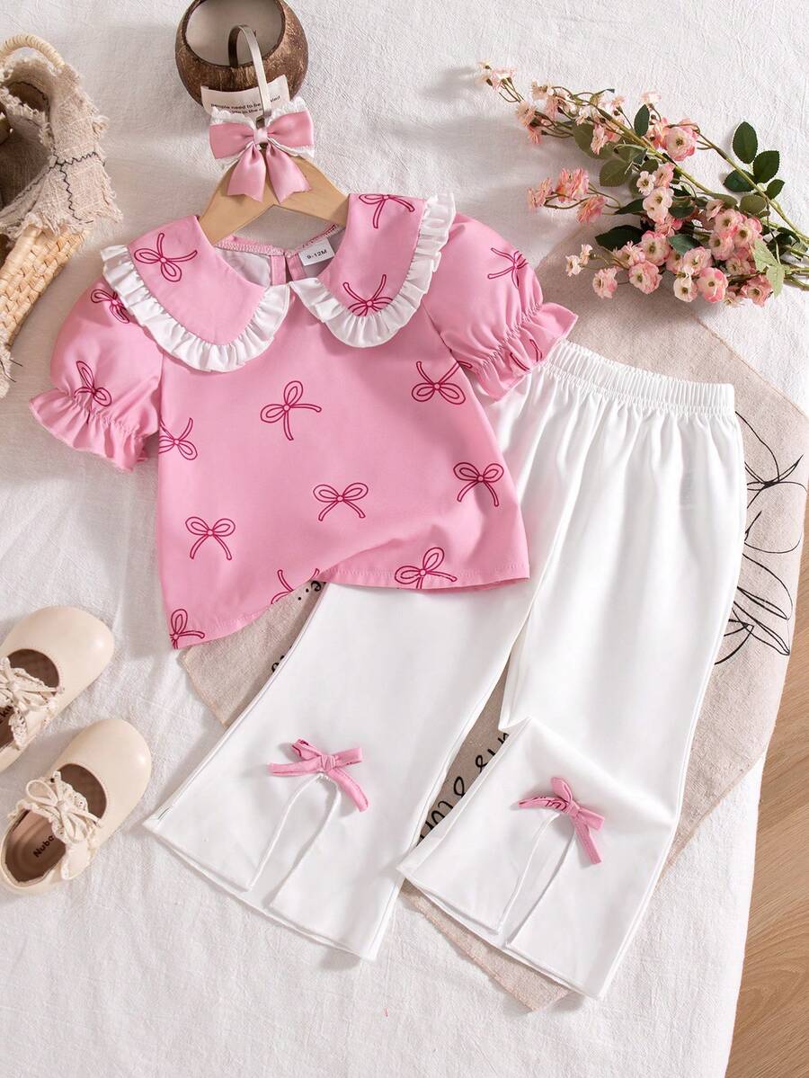 Bộ đồ mùa hè dễ thương cho bé gái: Áo tay phồng màu hồng cổ bèo nhún thắt nơ và quần ống loe cạp cao xẻ tà thắt nơ. - Hồng - Xem 1
