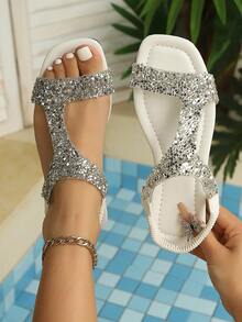Sandal nữ mùa hè quai chữ T đính đá, sandal đế bằng mũi vuông, quai ngang co giãn, sandal đế bằng đính đá sáng bóng, thiết kế đế mềm mại mang lại sự thoải mái suốt cả ngày, phù hợp cho mặc hàng ngày, đi biển, dự tiệc và hẹn hò. - Bạc - Xem 1