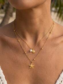 2 chiếc vòng cổ vỏ sò bằng thép không gỉ dành cho nữ, mạ vàng 14K, có thể điều chỉnh, nhiều lớp hình vỏ sò và sao biển với mặt dây chuyền ngọc trai giả, thích hợp cho mùa hè đi biển, đeo hàng ngày, làm quà sinh nhật, quà tặng bạn bè (Hướng sao biển ngẫu nhiên) - Nhiều màu - Xem 6