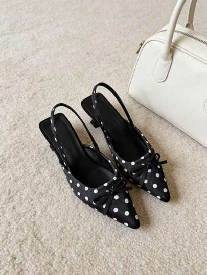 女士尖头波点露跟猫跟鞋，别致复古设计，适合办公室通勤和晚间外出，精致蝴蝶结细节，搭配中长连衣裙和修身套装，轻松打造巴黎风情。