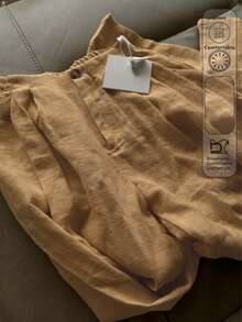 米白色阔腿裤，优雅端庄长裤，适合开斋节穿着。女士新款畅销舒适休闲裤，无腰带设计，后腰松紧带，柔软透气亚麻长裤，春季必备。 - 駝色 - 查看 2