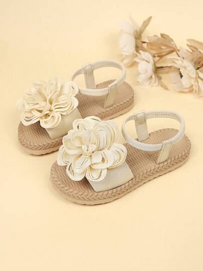 1 Pair Apricot Toddler Girls' Flat Sandals, Soft Fabric With Pompom & Peony Flower Decor, Round Toe Elastic Slip-On, Lightweight Non-Slip Sole, Fashion Holiday Beach Roman Sandals, Suitable For Casual Daily, Festival, School Wear, Spring/Summer New Arrival