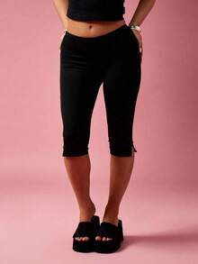 Quần legging lửng cạp cao xẻ gấu dành cho nữ - Quần lửng co giãn thoải mái cho mùa hè, màu đen. - màu đen - Xem 1