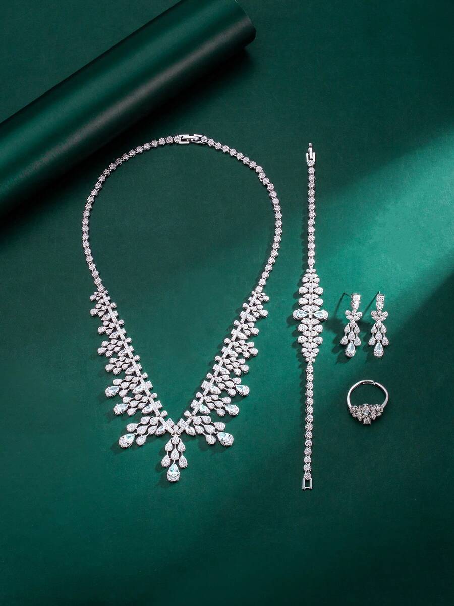 Bộ trang sức 5 món mạ Rhodium đính đá Cubic Zirconia cao cấp của Tylionnejewelry gồm dây chuyền, vòng tay, bông tai và nhẫn hở, thích hợp cho nữ giới, cô dâu, quà tặng Ngày của Mẹ, đám cưới, tiệc tùng, kỷ niệm. - Bạc - Xem 1