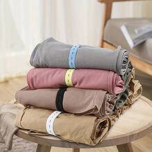 50 dây thun điều chỉnh được kèm nút cài - Chất liệu polyester bền chắc, lý tưởng để sắp xếp quần áo, tiết kiệm không gian hành lý và quản lý ga trải giường. - Nhiều màu - Xem 5
