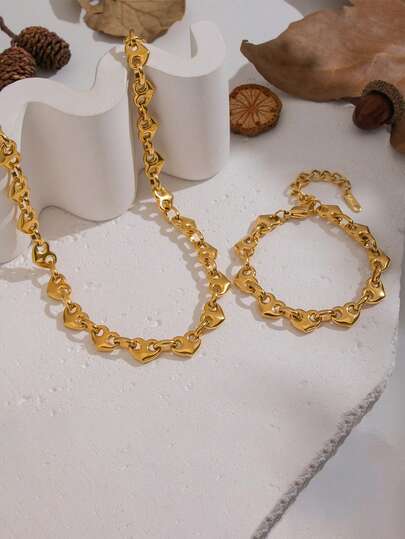 RAYQUEEN Nuevo conjunto de joyería de collar y pulsera de corazón hueco de acero inoxidable, adecuado para regalos de vacaciones