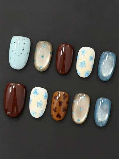 10pcs Pure Handmade Press On Nails Medium Nails Oval Nails With A Rich Chocolate Brown Base, Complemented By Cool Icy Blue And Retro Tortoiseshell, Adorned With Hand-Painted Flowers And Glittering Elements, It Perfectly Combines The Retro Elegance And Summer Freshness, Suitable For All Four Seasons.Gentle Elegant Cute Nails For Ladies And Girls Spring Summer Fall Winter Festivals Parties And Daily Life Use