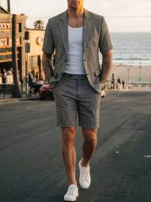男士短袖西装套装，包含短袖外套和短裤，休闲装，适合日常通勤、休闲和夏季穿着。 - 黑色 - 查看 5