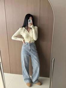 Quần jeans nữ ống đứng cạp cao thiết kế độc đáo với dây đeo khoét lỗ phía sau, thích hợp cho mùa hè. - Rửa nhẹ - Xem 7