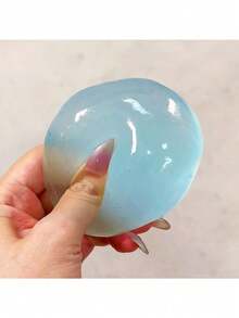 1个塑料慢回弹蓝色椰子油手工压制球，6厘米圆形，麦芽减压玩具，非常适合作为节日、生日、复活节、万圣节、圣诞节和派对的小礼物填充物。 - 升級款 - 查看 3