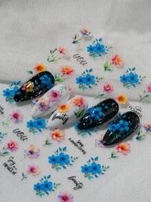 水彩风格的春季花卉艺术作品，以各种花卉图案为特色，包括簇拥的蓝色花朵、渐变橙色单瓣花和渐变紫色多瓣花，并配以“你”、“绽放”、“美丽”、“最盛放的时节已至”、“春天总会到来”、“春天是个奇迹”和“女孩力量”等振奋人心的英文短语，营造出轻松、浪漫和充满希望的氛围，适合春季时尚和手账装饰美甲贴纸。 - 彩色 - 查看 10