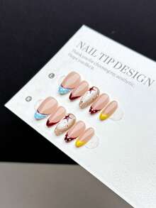 10片纯手工制作的按压式美甲贴片，短款杏仁形，复古简约风格。指甲以手绘裸色底色为底，搭配复古多色波点法式美甲图案，颜色包括酒红色、浅蓝色、黄色等，并点缀以玻璃珠猫眼效果。 - 彩色 - 查看 5