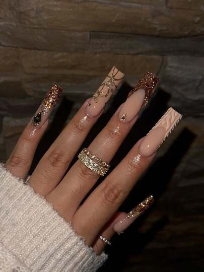 Medium-Sized Rectangular Press-On Nail Stickers, 24-Piece DIY Set. Features A Nude-Pink Base With A Coffee-Gold Glitter Gradient, Gold Accents, And 3D Textured Details. These Middle Eastern-Inspired, Light-Luxury Nail Stickers Are Perfect For Parties, Weddings, And Everyday Wear. They Are Removable And Reusable.