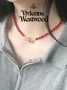 Vivienne Westwood Dây chuyền hình sao Thổ bằng pha lê nhân tạo màu đỏ của Messaline Collection, mạ vàng và đồng thau. - Đỏ - Xem 2