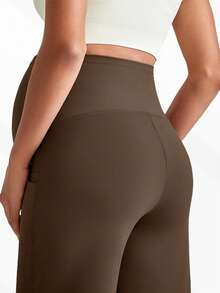 1 pièce Pantalon de maternité avec poches, avec un design de taille élastique qui ne comprime pas l'abdomen, deux poches latérales pour la commodité. Style jambe droite avec un design de support abdominal haut élastique en forme de U/complet. Fabriqué dans un tissu très élastique. Idéal pour la maternité, le yoga, l'entraînement, le jogging, la fitness et les sports - Café - Voir 5