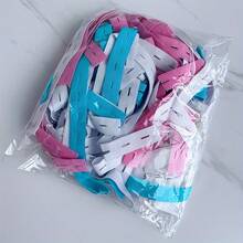 50 dây thun điều chỉnh được kèm nút cài - Chất liệu polyester bền chắc, lý tưởng để sắp xếp quần áo, tiết kiệm không gian hành lý và quản lý ga trải giường. - Nhiều màu - Xem 6