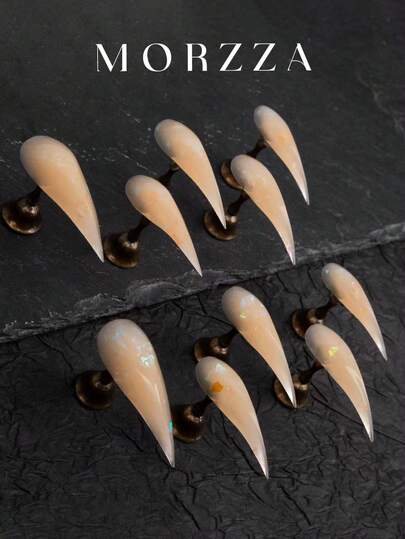 Transforma tus uñas con un set de 10 uñas postizas de 40MM de estilo vintage, dulce, casual y elegante, con un diseño de color naranja cálido con brillo, hecho a mano con forma de garra de dragón. Es una excelente opción para niñas y mujeres refinadas y dulces.