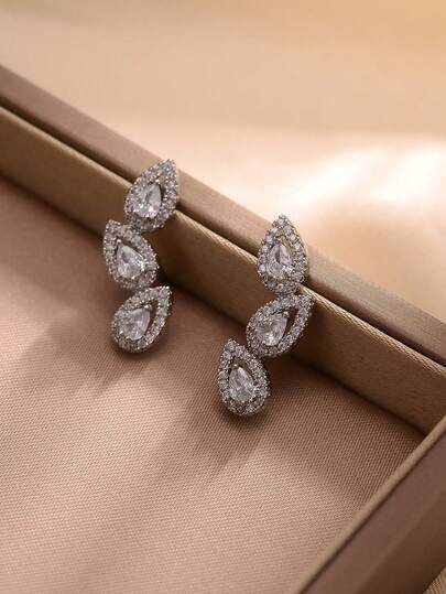 2 pièces Boucles d'oreilles goutte en zircone cubique ton cuivre, convient pour les occasions formelles comme les galas et les mariages à assortir avec une tenue de soirée, ajoute une touche luxueuse et élégante. Convient également pour les rendez-vous et le thé de l'après-midi chic, peut être assorti avec des robes et des chemisiers, apporte une touche douce et raffinée. Apprécié par ceux qui aiment les styles d'accessoires élégants, luxueux et dynamiques.