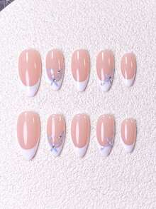 Bộ 10 miếng dán móng tay thủ công, dành cho móng ngắn, móng giả, kiểu móng Pháp hình hạnh nhân, màu nude, kiểu móng nhẹ nhàng tươi tắn cho mùa xuân và mùa hè, đầu móng kiểu Pháp màu trắng được vẽ tay và họa tiết hoa màu xanh dương đính đá, bao gồm dụng cụ làm móng, phù hợp cho nhiều dịp, dễ dán và dễ gỡ, miếng dán móng hình hạnh nhân dành cho phụ nữ và bé gái. - Xanh và trắng - Xem 4