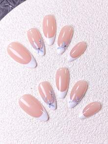 Bộ 10 miếng dán móng tay thủ công, dành cho móng ngắn, móng giả, kiểu móng Pháp hình hạnh nhân, màu nude, kiểu móng nhẹ nhàng tươi tắn cho mùa xuân và mùa hè, đầu móng kiểu Pháp màu trắng được vẽ tay và họa tiết hoa màu xanh dương đính đá, bao gồm dụng cụ làm móng, phù hợp cho nhiều dịp, dễ dán và dễ gỡ, miếng dán móng hình hạnh nhân dành cho phụ nữ và bé gái. - Xanh và trắng - Xem 5