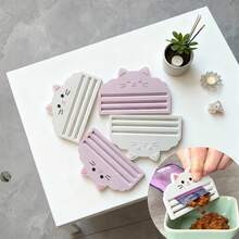 1个猫粮挤压器 - 高效挤压猫粮袋，最大限度保留剩余猫粮，避免浪费。专为注重清洁喂食和操作便捷的猫主人设计。这款挤压器适用于各种猫粮袋，易于清洁，保持卫生。 - 500ml - 查看 2