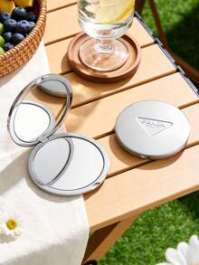 Prada Gương tròn gấp gọn màu bạc, thích hợp cho nhiều dịp như du lịch, họp mặt, công việc và trường học, phù hợp với mọi lứa tuổi. - Bạc - Xem 9