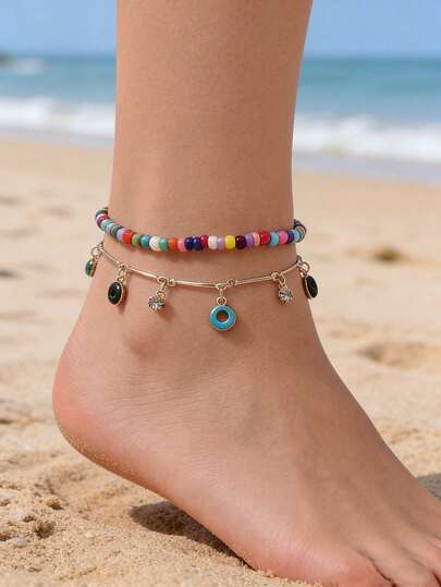 2件套波西米亚风彩色串珠甜甜圈吊坠脚链套装，适合女士日常休闲海滩装扮，吊坠颜色随机。