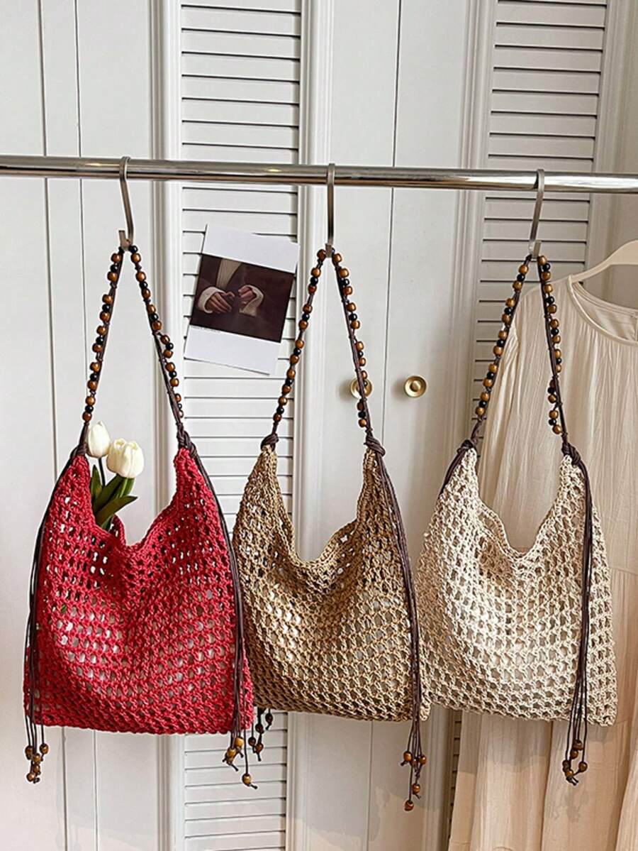 1 chiếc túi tote dệt thủ công bằng cotton, thoáng khí, có móc len, đính hạt cườm và tua rua, kiểu dáng Bohemian, có lớp lót vải, tạo cảm giác thoải mái, phù hợp đi làm hàng ngày, phong cách nghệ thuật trẻ trung, đi biển, dã ngoại.
