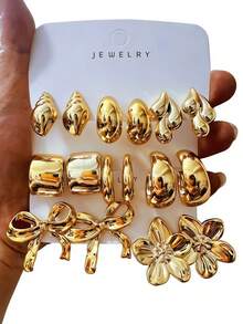 Bộ 16 khuyên tai vàng thời trang dành cho nữ, kiểu dáng hình học C-hoop, nơ và hoa 5 cánh, phù hợp cho cả ngày thường và dịp lễ. Được làm từ nhựa ABS mạ vàng UV, bền màu và không gây dị ứng. - Vàng - Xem 1