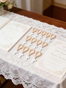 20件套木质念珠套装，包含10颗木珠和10个白色网袋，配有白色木质十字架吊坠，适用于洗礼、初领圣体、坚信礼、新娘送礼会、婚礼等场合，男女皆宜。 - A - 查看 2