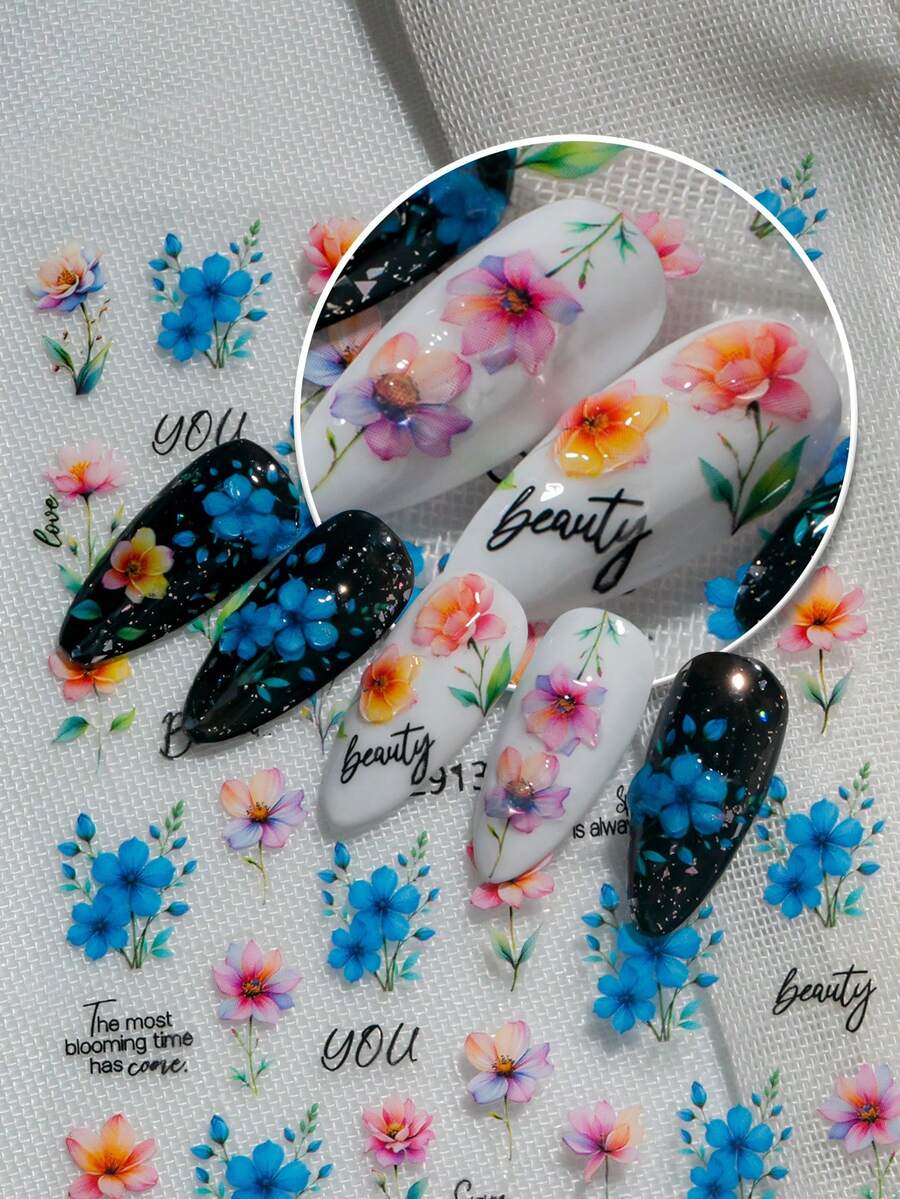水彩风格的春季花卉艺术作品，以各种花卉图案为特色，包括簇拥的蓝色花朵、渐变橙色单瓣花和渐变紫色多瓣花，并配以“你”、“绽放”、“美丽”、“最盛放的时节已至”、“春天总会到来”、“春天是个奇迹”和“女孩力量”等振奋人心的英文短语，营造出轻松、浪漫和充满希望的氛围，适合春季时尚和手账装饰美甲贴纸。 - 彩色 - 查看 1