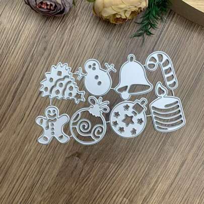 Bộ khuôn cắt kim loại, bao gồm các hình người tuyết, cây thông, chuông và nến. Thích hợp cho việc tự làm sổ lưu niệm, thiệp thủ công và trang trí ảnh. Bao gồm khuôn mẫu và khuôn cắt.