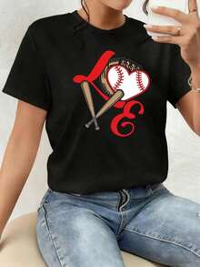 The Print Features A Heart With A Baseball Texture, Embraced By A Glove And Two Crossed Bats, Symbolizing The Love Of The Sport, Passion, And Team Unity. Women's T-Shirt, 100% Cotton, Comfortable For Everyday Wear, Modern And Soft - 黑色 - 查看 1