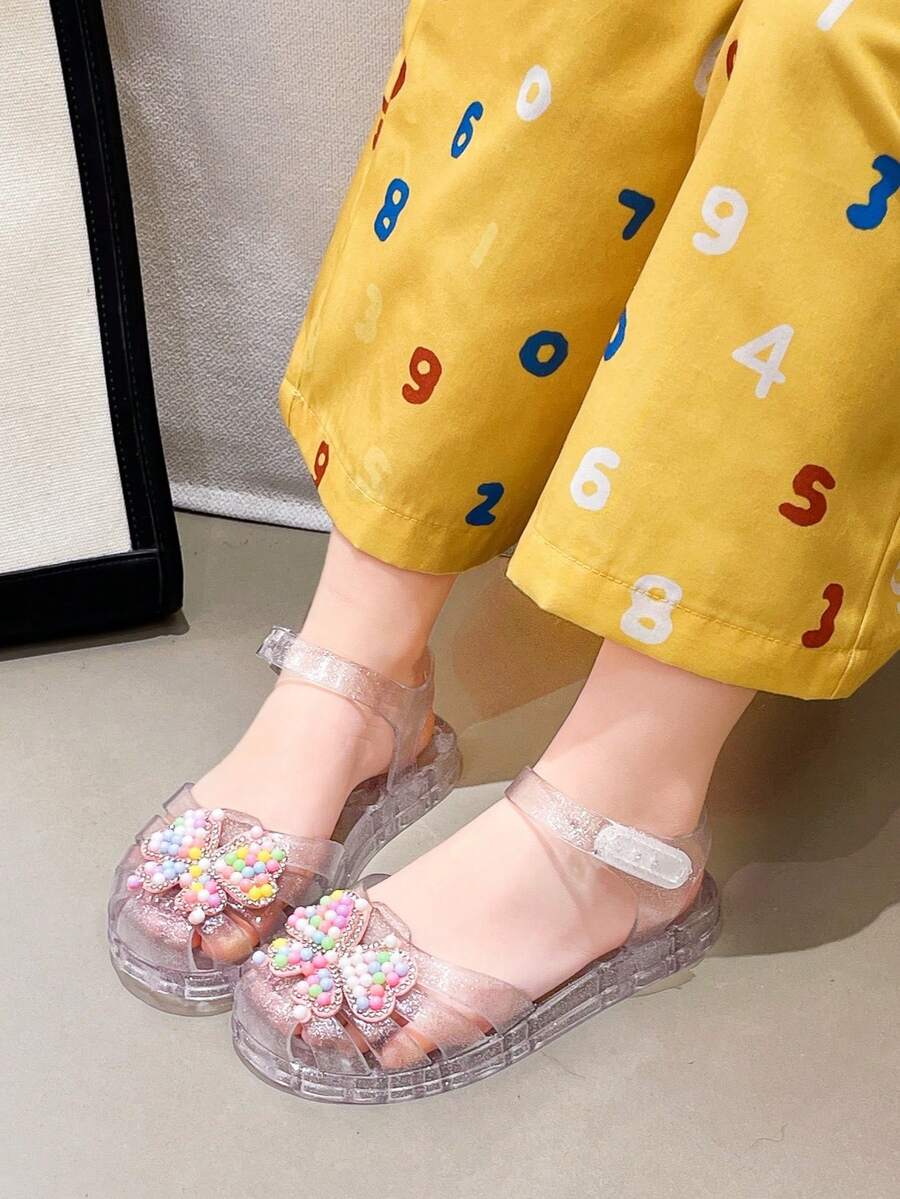 女童亮片蝴蝶结凉鞋，露趾踝带公主鞋，适合夏季海滩和日常穿着 - 無色 - 查看 1