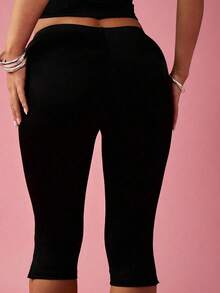 Quần legging lửng cạp cao xẻ gấu dành cho nữ - Quần lửng co giãn thoải mái cho mùa hè, màu đen. - màu đen - Xem 2