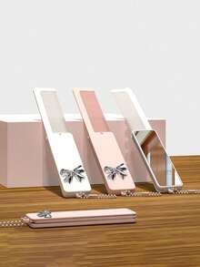 Peine y espejo de maquillaje plegable 2 en 1 con decoración de lazo 3D plateado estilo Y2K, lindo peine portátil con espejo y llavero, herramienta de belleza multifuncional contemporánea para llavero, colgante, espejo de mesa, espejo de mano, adecuado para viajes - Talla única - Ver 4