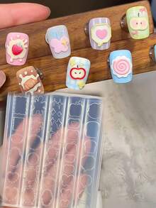 1 pieza Molde de arte de uñas de silicona transparente con diseños lindos de marco, globo de texto, estrella, corazón, manzana y mariposa - transparente - Ver 9