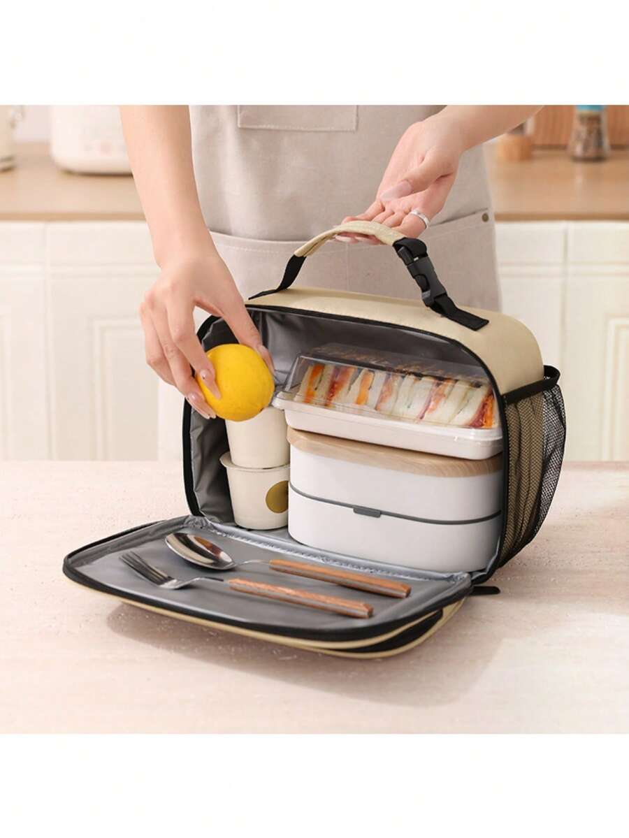 1 Túi đựng cơm trưa cách nhiệt dung tích lớn, chất liệu polyester chống thấm nước, chống rò rỉ, có miệng túi bên hông và tay cầm phía trên, túi đựng cơm trưa di động có thể tái sử dụng.
